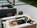Workstation sink with wooden cutting board